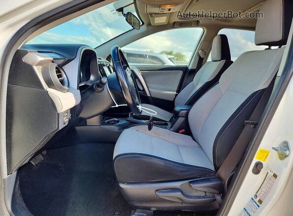 JTMRJREV0GD002198 2016 TOYOTA RAV4 White Front interior view