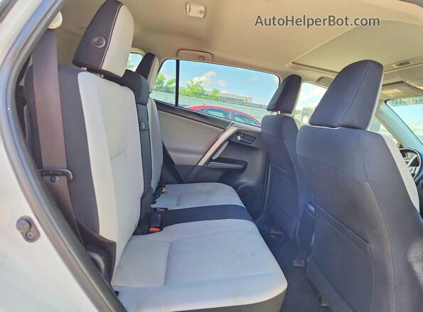 JTMRJREV0GD002198 2016 TOYOTA RAV4 White Rear seats view