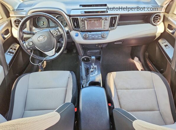 JTMRJREV0GD002198 2016 TOYOTA RAV4 White Dashboard view