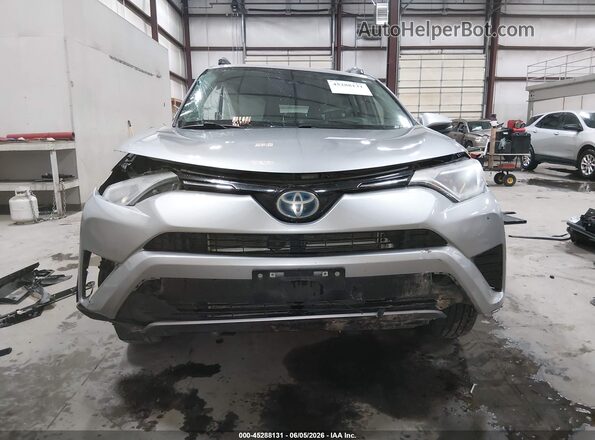 JTMRJREV0JD180961 2018 TOYOTA RAV4 HYBRID Silver Вид задньої частини салону