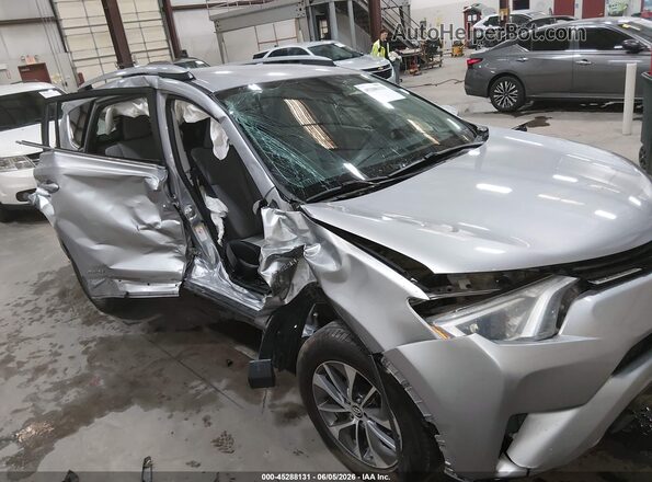 JTMRJREV0JD180961 2018 TOYOTA RAV4 HYBRID Silver 