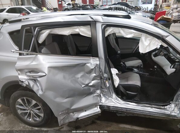 JTMRJREV0JD180961 2018 TOYOTA RAV4 HYBRID Silver 