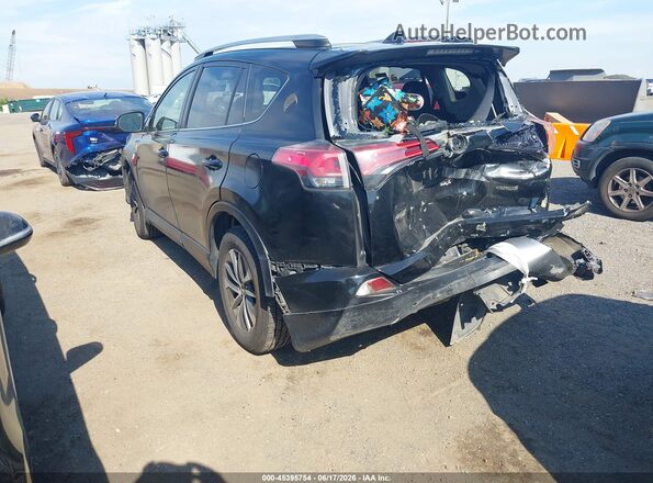 JTMRJREV0JD217202 2018 TOYOTA RAV4 HYBRID Черный Задняя левая четверть