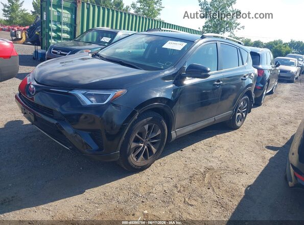 JTMRJREV0JD217202 2018 TOYOTA RAV4 HYBRID Черный Передняя левая четверть