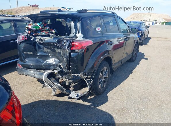 JTMRJREV0JD217202 2018 TOYOTA RAV4 HYBRID Черный Задняя правая четверть