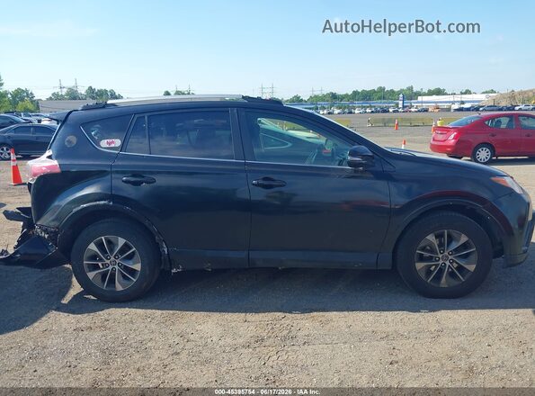 JTMRJREV0JD217202 2018 TOYOTA RAV4 HYBRID Черный Вид задней части салона