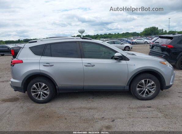 JTMRJREV1HD079812 2017 TOYOTA RAV4 HYBRID Silver Rear interior view