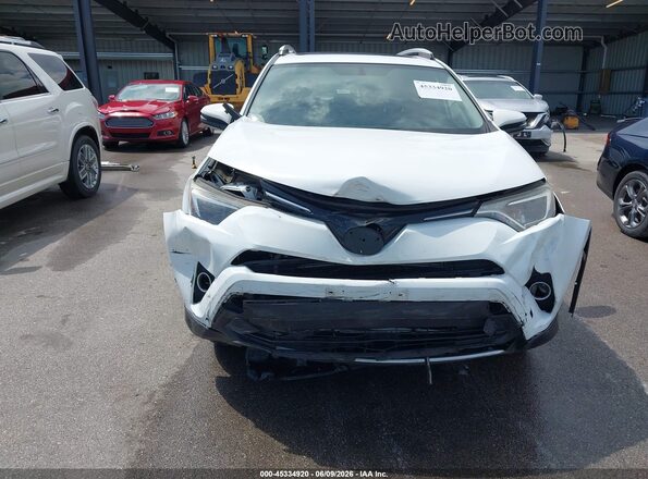 JTMRJREV2GD038040 2016 TOYOTA RAV4 HYBRID Белый Вид щитка приборов