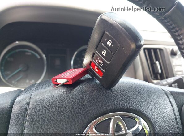 JTMRJREV2GD038040 2016 TOYOTA RAV4 HYBRID Белый Вид панели приборов