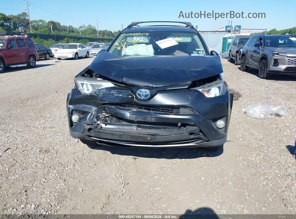 JTMRJREV2JD247995 2018 TOYOTA RAV4 HYBRID Black ხელსაწყოთა პანელის ხედი
