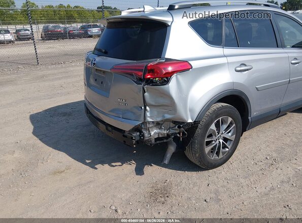 JTMRJREV4JD178470 2018 TOYOTA RAV4 HYBRID Silver Front view