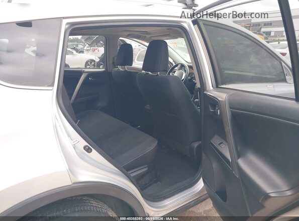 JTMRJREV5GD010927 2016 TOYOTA RAV4 HYBRID Silver Vista de los asientos traseros