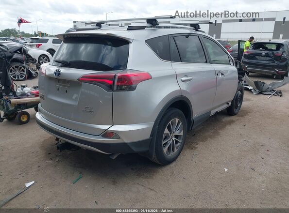 JTMRJREV5GD010927 2016 TOYOTA RAV4 HYBRID Silver Trasero derecho