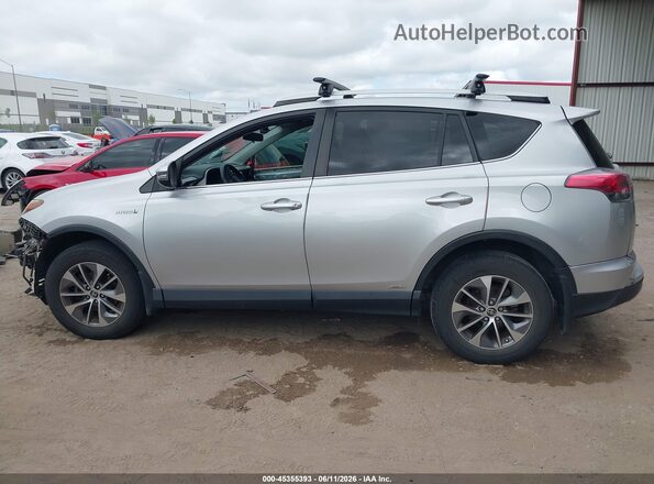JTMRJREV5GD010927 2016 TOYOTA RAV4 HYBRID Silver Vista interior trasera