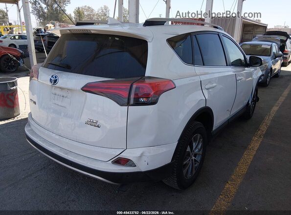 JTMRJREV5GD032734 2016 TOYOTA RAV4 HYBRID White Tył prawy