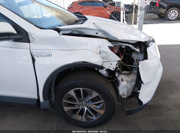 JTMRJREV5GD032734 2016 TOYOTA RAV4 HYBRID White Widok z przodu