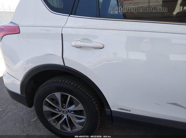 JTMRJREV5GD032734 2016 TOYOTA RAV4 HYBRID White 