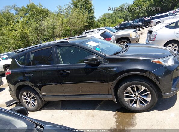 JTMRJREV5JD207913 2018 TOYOTA RAV4 HYBRID Black Vista interior trasera