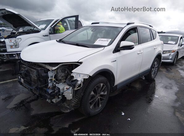 JTMRJREV6GD029681 2016 TOYOTA RAV4 HYBRID White Front left