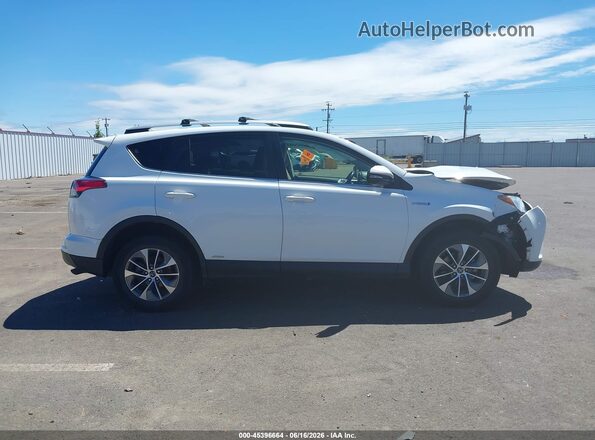 JTMRJREV6GD057609 2016 TOYOTA RAV4 HYBRID White Սալոնի հետևի տեսք