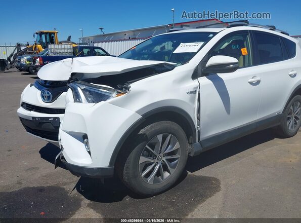JTMRJREV6GD057609 2016 TOYOTA RAV4 HYBRID White 