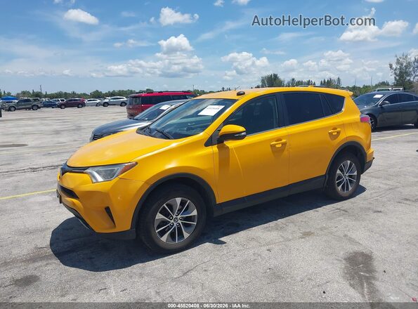 JTMRJREV6JD249362 2018 TOYOTA RAV4 HYBRID Yellow Front left