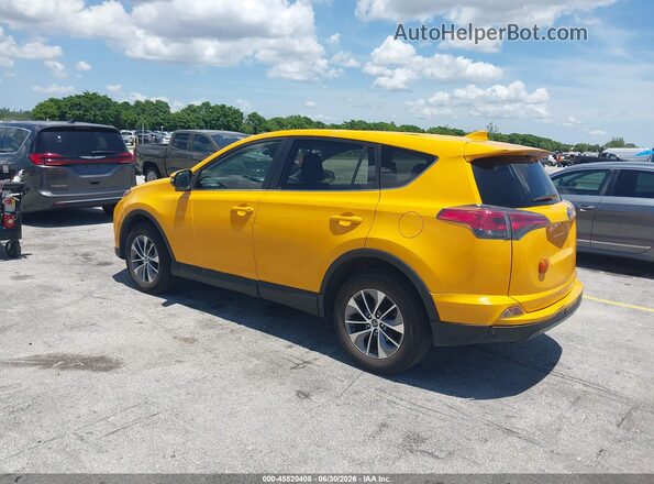 JTMRJREV6JD249362 2018 TOYOTA RAV4 HYBRID Yellow Rear left