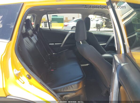 JTMRJREV6JD249362 2018 TOYOTA RAV4 HYBRID Yellow VIN sticker view
