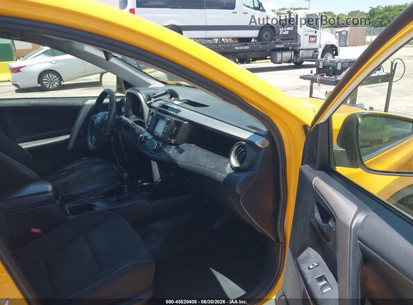 JTMRJREV6JD249362 2018 TOYOTA RAV4 HYBRID Yellow Front interior view