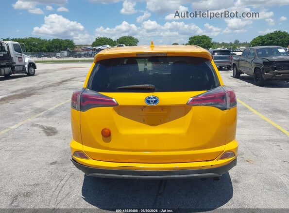 JTMRJREV6JD249362 2018 TOYOTA RAV4 HYBRID Yellow 