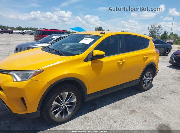 JTMRJREV6JD249362 2018 TOYOTA RAV4 HYBRID Yellow 