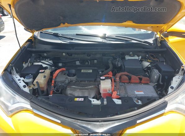 JTMRJREV6JD249362 2018 TOYOTA RAV4 HYBRID Yellow Rear view