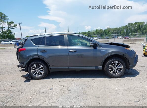 JTMRJREV7GD000514 2016 TOYOTA RAV4 HYBRID Gray Widok wnętrza z tyłu