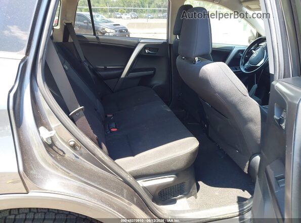 JTMRJREV7GD000514 2016 TOYOTA RAV4 HYBRID Gray Widok naklejki z numerem VIN