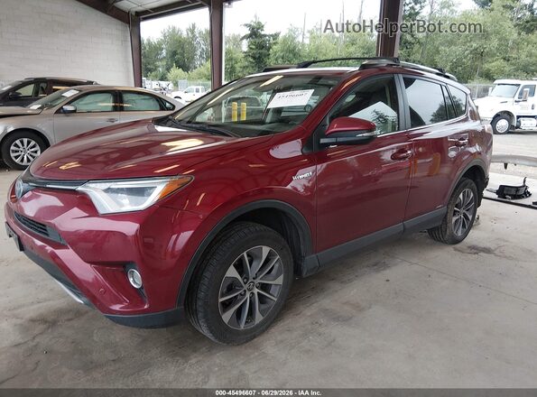 JTMRJREV8JD238556 2018 TOYOTA RAV4 HYBRID Red Vista tres cuartos delantera izquierda