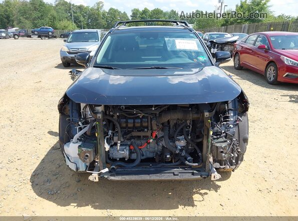 JTMRWRFV0LD072441 2020 TOYOTA RAV4 HYBRID Black Rear interior view