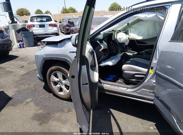 JTMRWRFV3KD038573 2019 TOYOTA RAV4 HYBRID Silver Вид салону спереду