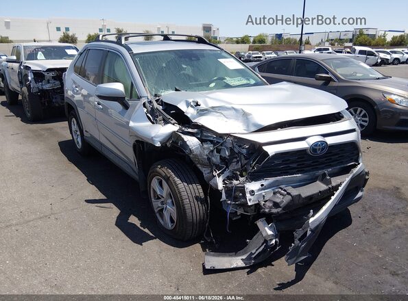 JTMRWRFV3KD038573 2019 TOYOTA RAV4 HYBRID Silver Вид задньої частини салону