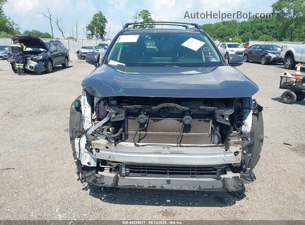 JTMRWRFV4KD030899 2019 TOYOTA RAV4 HYBRID Gray Вид задньої частини салону