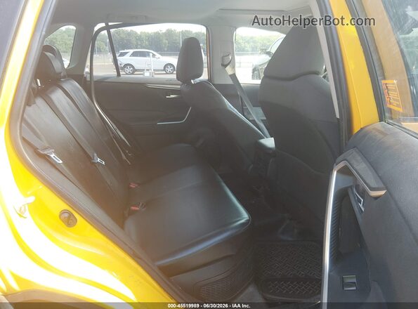 JTMRWRFV7KD012302 2019 TOYOTA RAV4 HYBRID Yellow VIN sticker view