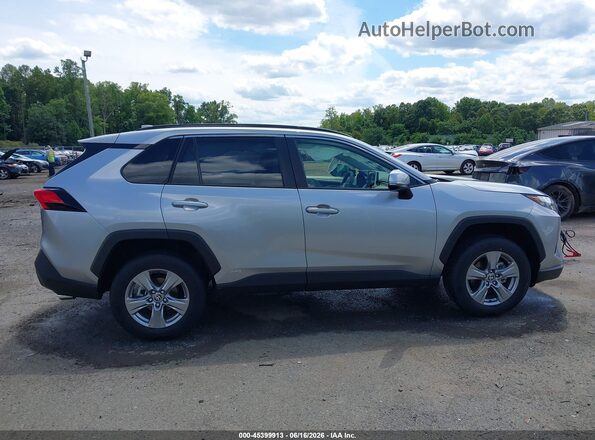 JTMRWRFV7SJ078513 2025 TOYOTA RAV4 HYBRID Silver Вид задньої частини салону