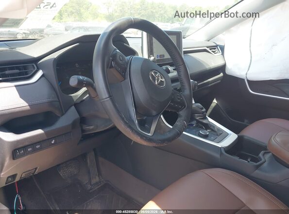 JTMRWRFV8SJ088807 2025 TOYOTA RAV4 HYBRID Gray Widok wnętrza z przodu