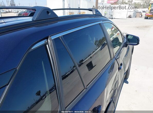 JTMRWRFV9SD303299 2025 TOYOTA RAV4 HYBRID Blue Rear interior view