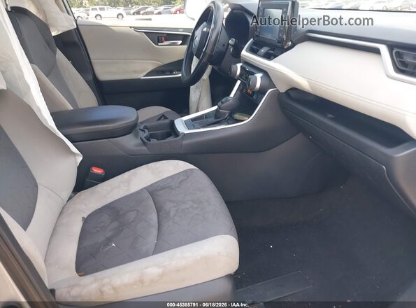 JTMW1RFV0KD023529 2019 TOYOTA RAV4 Gray Vista interior delantera
