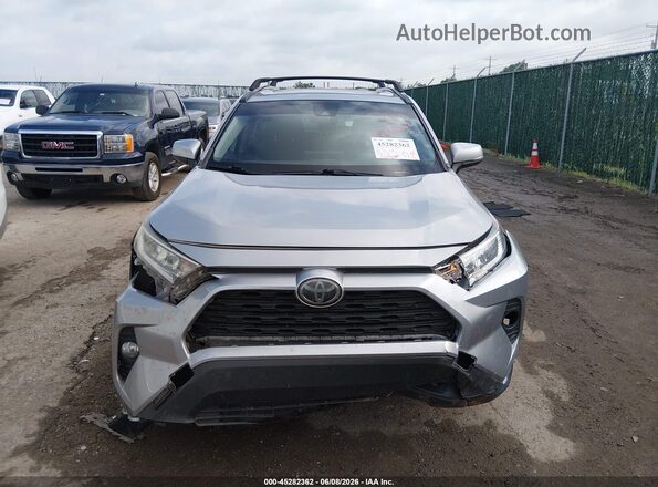 JTMW1RFV7KJ001710 2019 TOYOTA RAV4 Silver Widok zestawu wskaźników