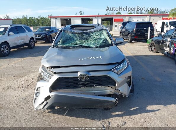 JTMW1RFVXLD045944 2020 TOYOTA RAV4 Silver Vista interior trasera