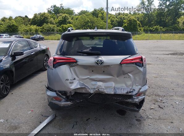 JTMWFREV0JJ160327 2018 TOYOTA RAV4 Silver Вид спереду