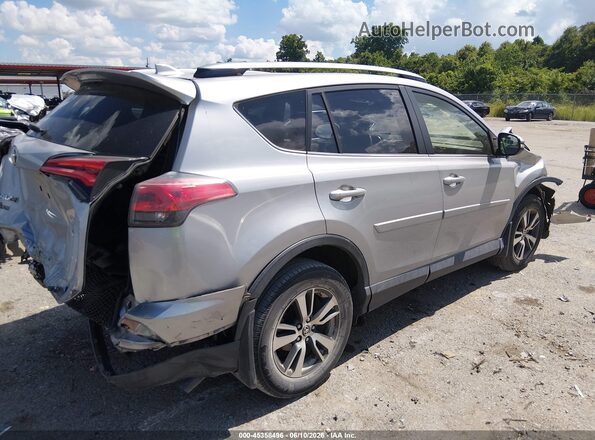 JTMWFREV0JJ160327 2018 TOYOTA RAV4 Silver Задня права чверть