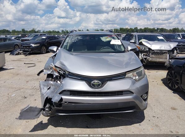 JTMWFREV0JJ160327 2018 TOYOTA RAV4 Silver Вид щитка приладів