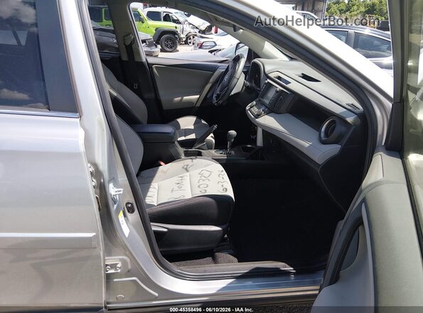 JTMWFREV0JJ160327 2018 TOYOTA RAV4 Silver Вид салону спереду